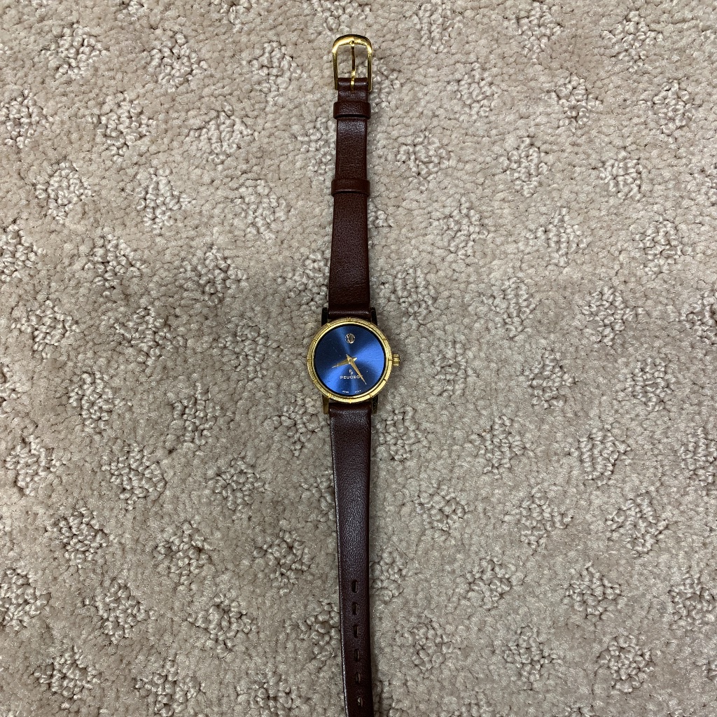 Women’s Peugeot Leather Band Watch.
